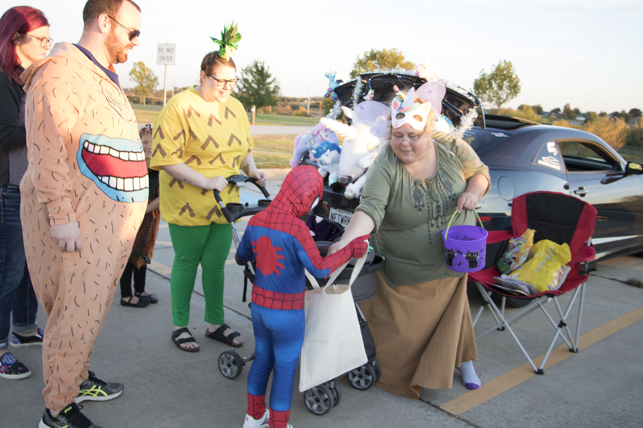 Volunteer hands out candy