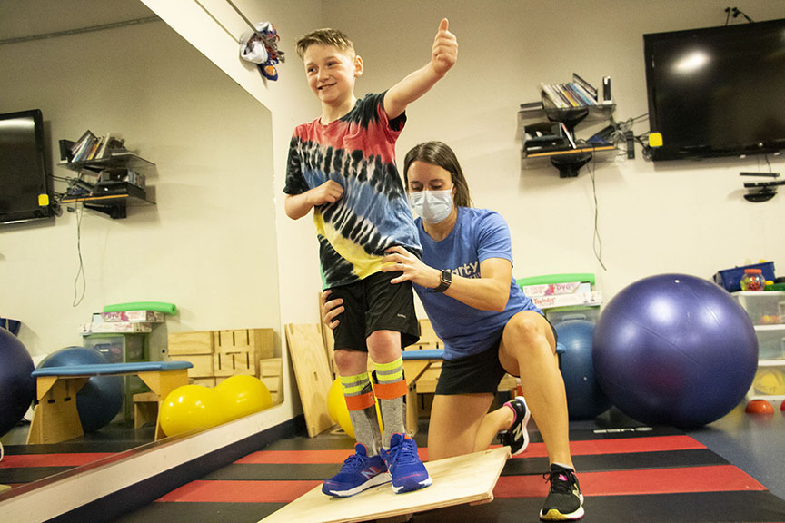 Patient with physical therapist